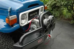 ARB 3420020 Front Deluxe Bull Bar Winch Mount Bumper; 40 Series;