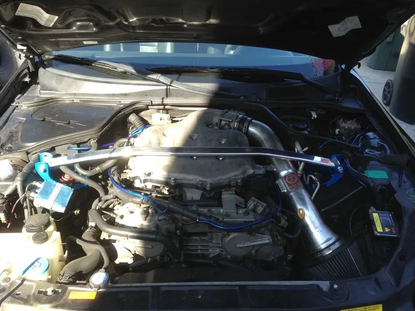 Megan Racing Strut Bar Infiniti G35 (03-07) Front Upper - Race Spec - Polished