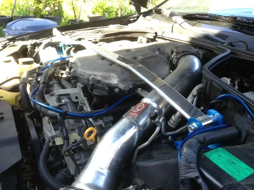 Megan Racing Strut Bar Infiniti G35 (03-07) Front Upper - Race Spec - Polished